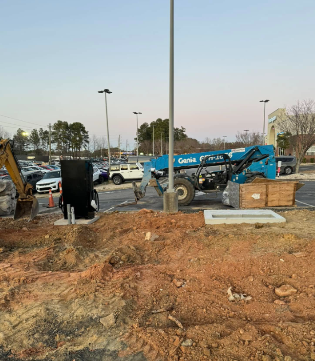Excavation and conduit work for parking lot electrical infrastructure
